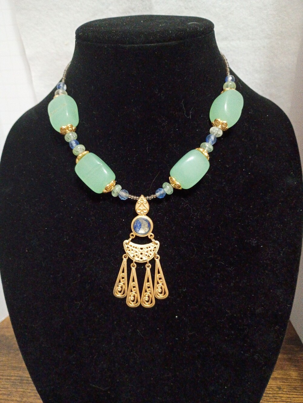 George Light Green Necklace with Gold Toned Dangle. Vintage